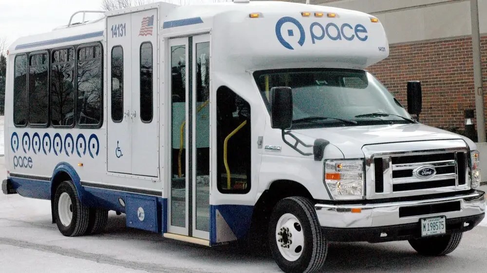 Image of Pace Bus Parked outside of building